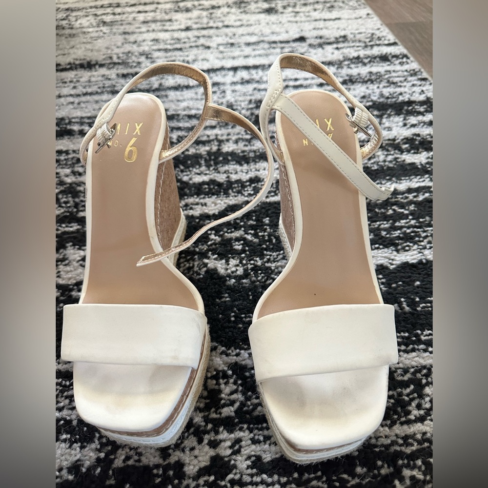 Platforms. White. Comfy. Straps around ankle.